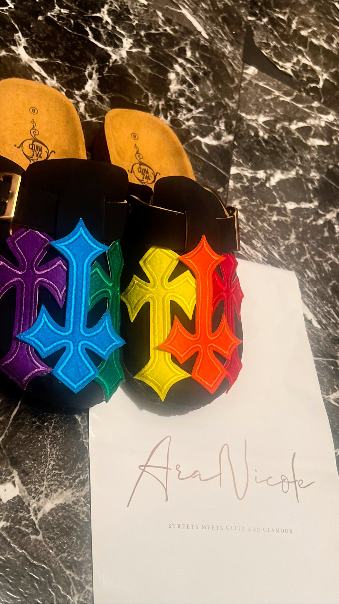 “Rainbow cross” clogs