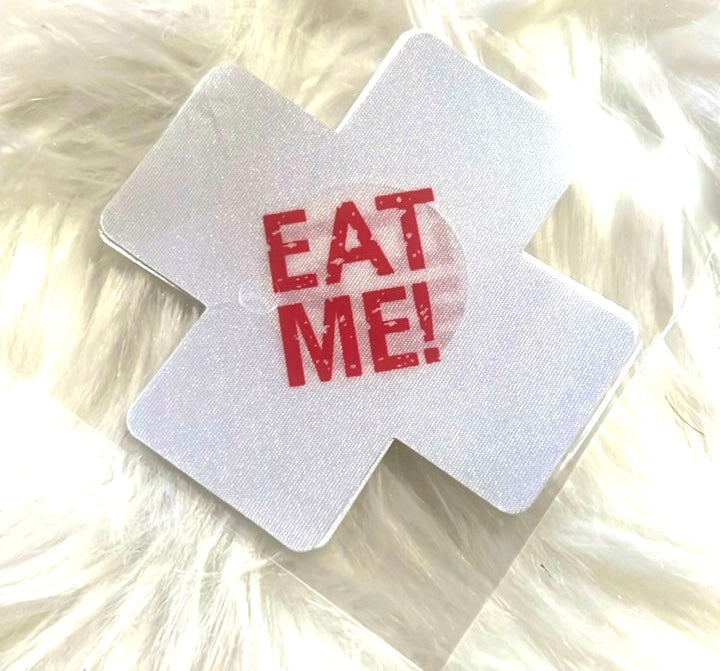 “Eat me” cross nip covers (silver)