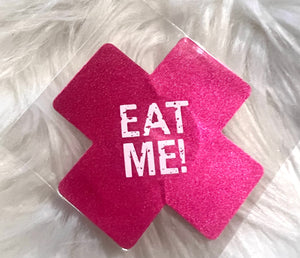 “Eat me” cross nipple covers (pink)