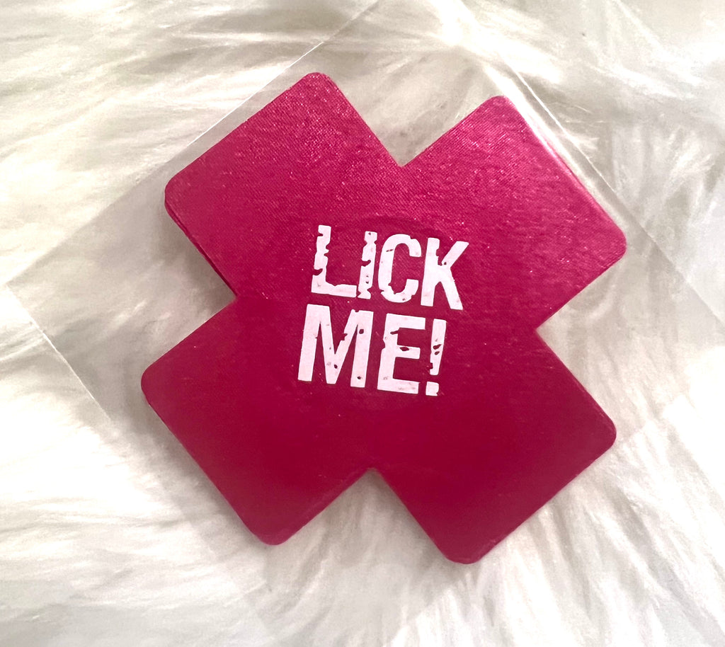 “Lick me” cross nip covers (pink)